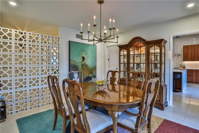 dining room featuring an inviting chandelier