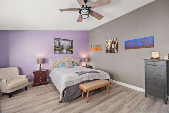 bedroom featuring ceiling fan and light hardwood / wood-style floors