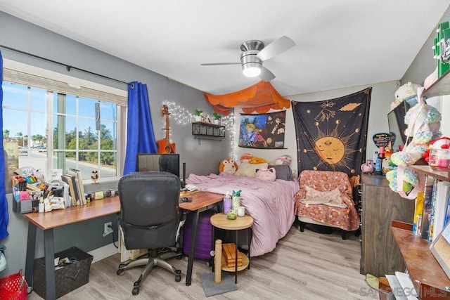 bedroom featuring ceiling fan and light wood-type flooring