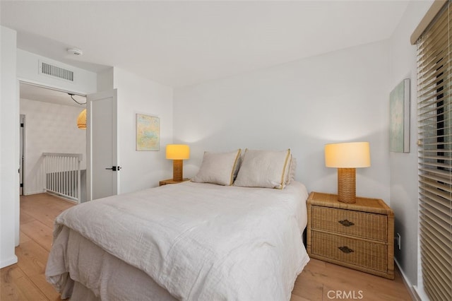 bedroom featuring light hardwood / wood-style floors