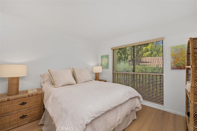 bedroom featuring light hardwood / wood-style flooring