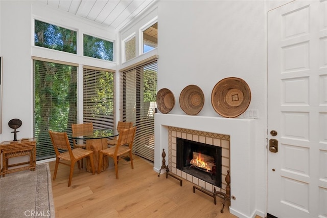 sunroom / solarium featuring a fireplace