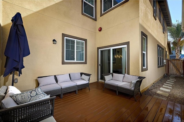 wooden deck with an outdoor hangout area