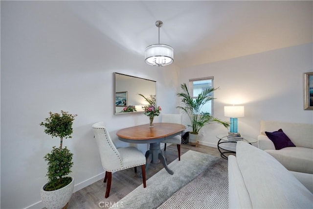 dining space with light wood-type flooring