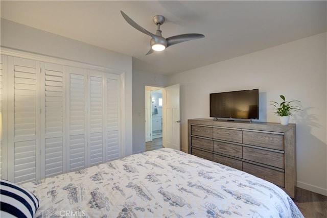 bedroom featuring ceiling fan and a closet