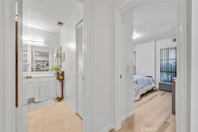 interior space with light tile patterned floors