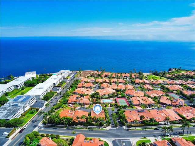 bird's eye view featuring a water view and a residential view