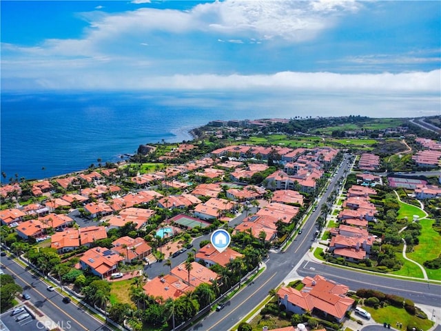 aerial view with a water view and a residential view