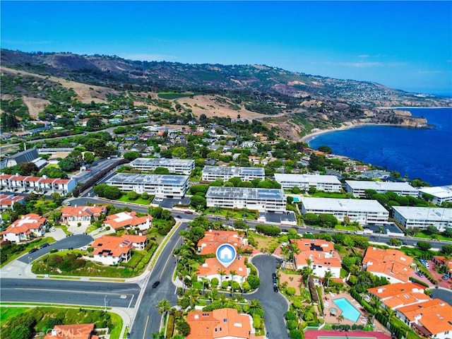 bird's eye view with a water and mountain view