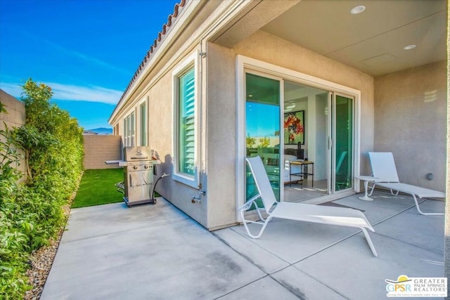 view of patio with a grill