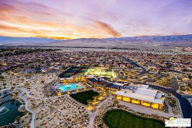 aerial view at dusk with a mountain view