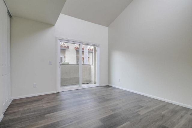 empty room with hardwood / wood-style floors