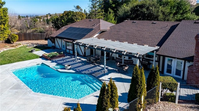 view of pool with a pergola and a patio area