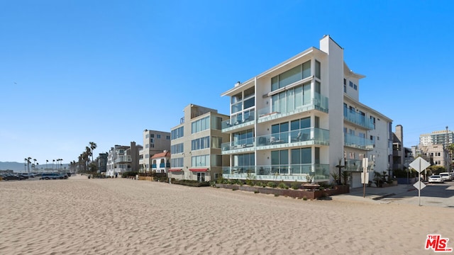 view of building exterior with a water view