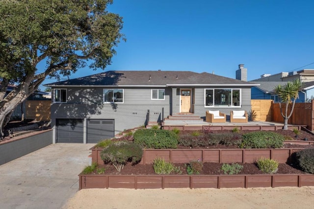 view of front of home with a garage