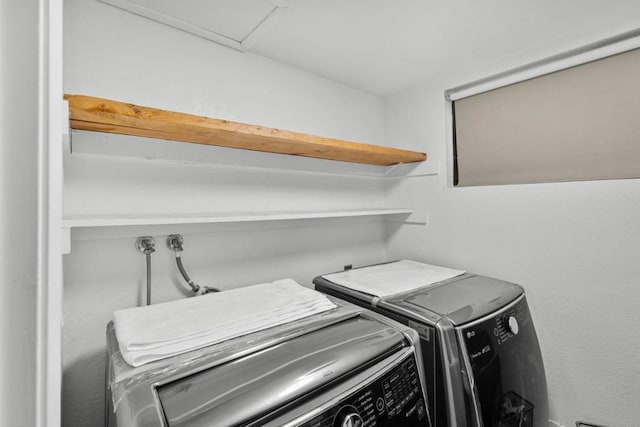 laundry room featuring washer and clothes dryer