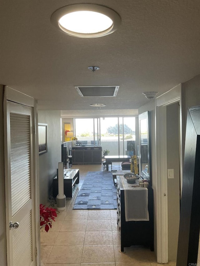 living room with light tile patterned floors