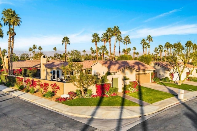 view of front of property with a garage