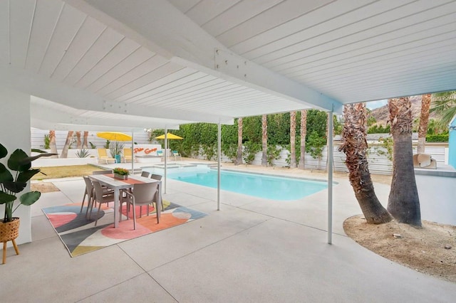 view of pool with a patio area