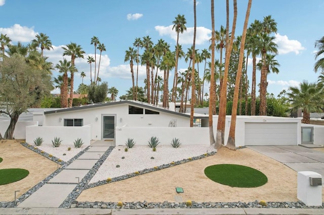 ranch-style home with a garage