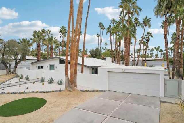 single story home featuring a garage