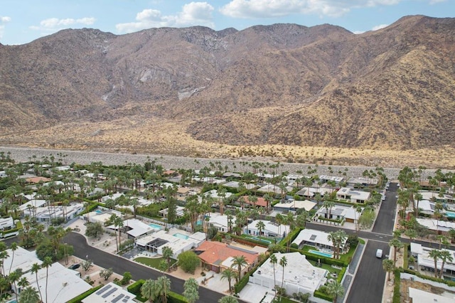 birds eye view of property featuring a mountain view