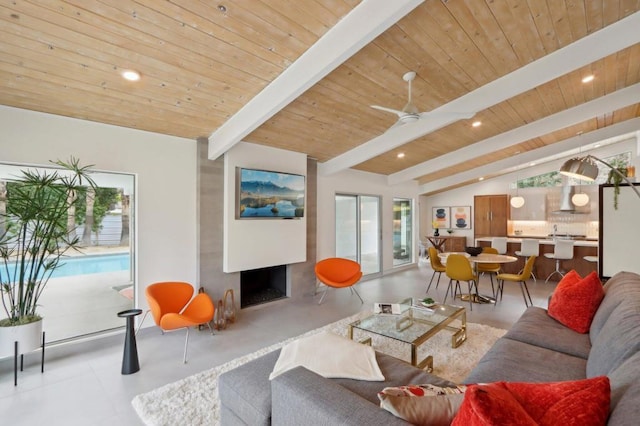 living room featuring wooden ceiling, vaulted ceiling with beams, and ceiling fan