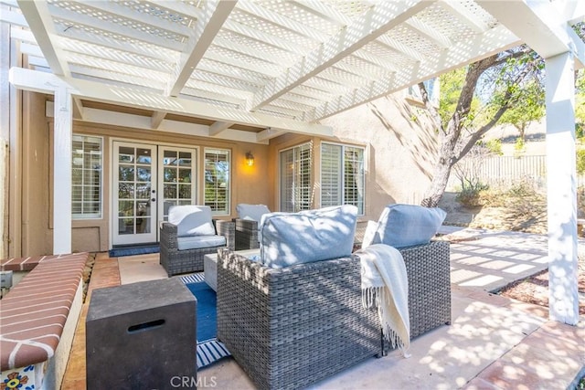 view of patio with outdoor lounge area, french doors, and a pergola