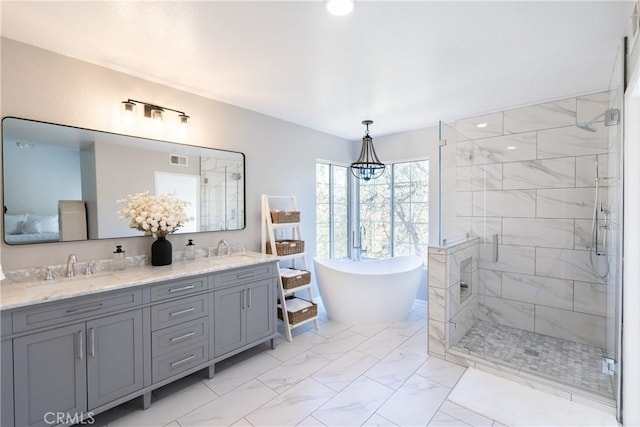 bathroom featuring vanity and plus walk in shower