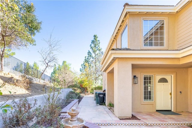 view of home's exterior with a patio