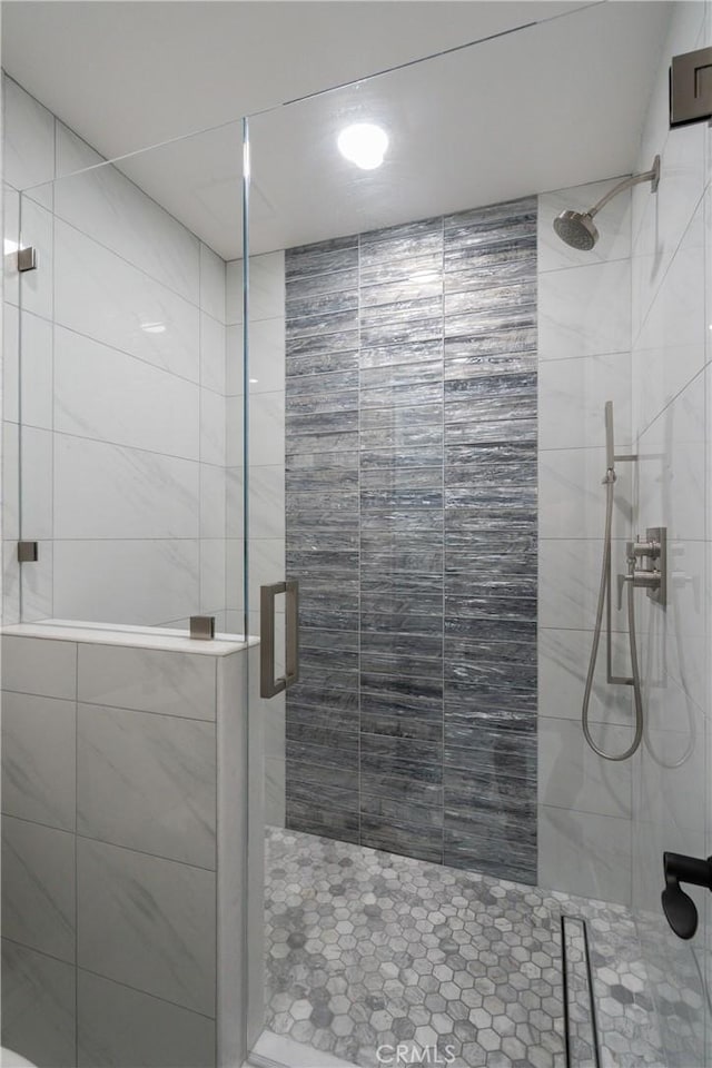 bathroom featuring an enclosed shower