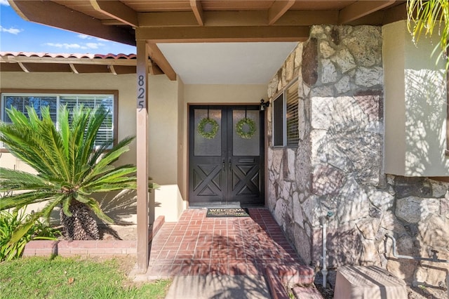 doorway to property with french doors