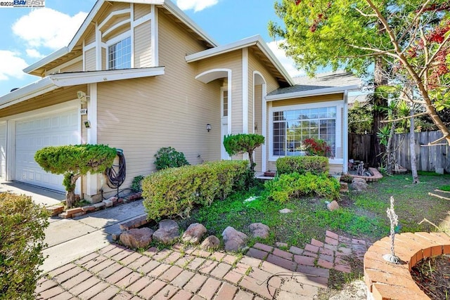 view of front of home featuring a garage