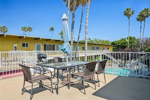 view of patio / terrace with a community pool