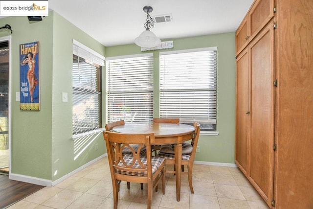 dining room with light tile patterned floors