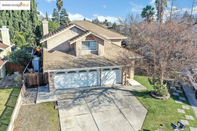 view of property exterior featuring a lawn and a garage