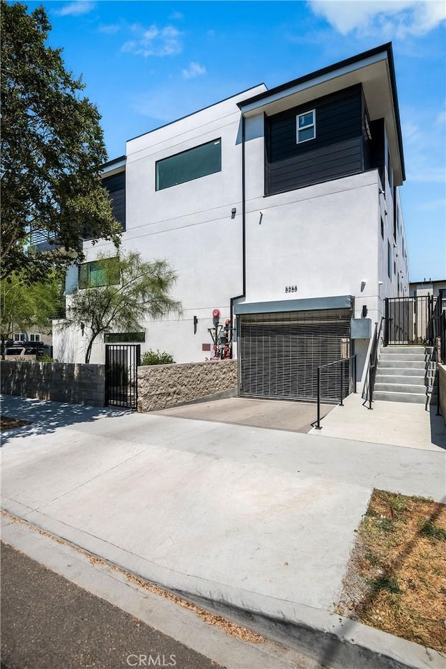 view of front of property featuring a garage