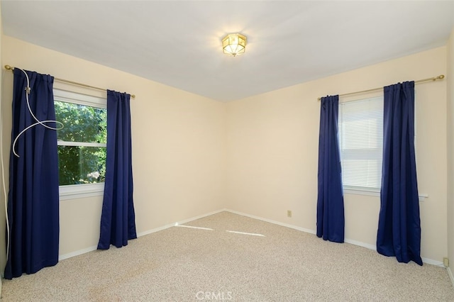 view of carpeted spare room