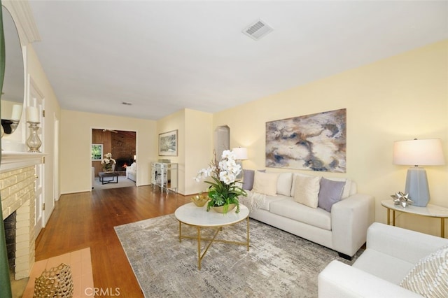 living room with dark hardwood / wood-style floors