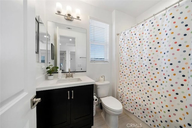 bathroom with toilet, a shower with shower curtain, tile patterned flooring, and vanity