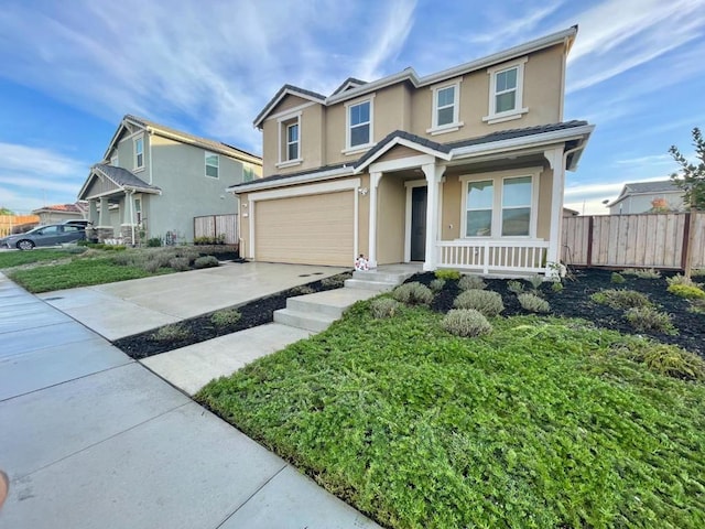 view of front of property with a front lawn and a garage