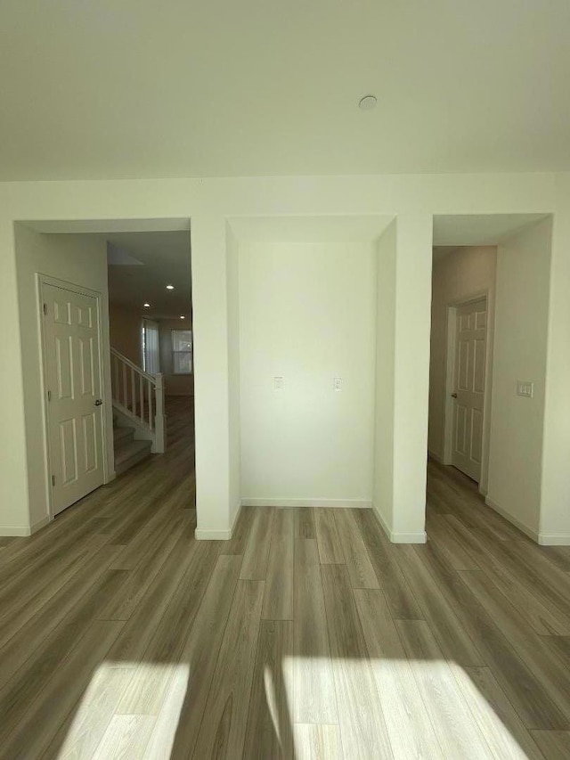 spare room featuring hardwood / wood-style flooring