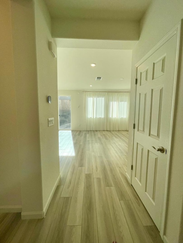 hall featuring light hardwood / wood-style flooring