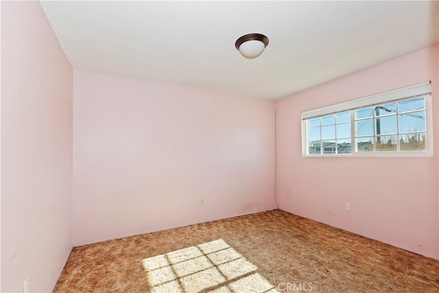 spare room with carpet flooring