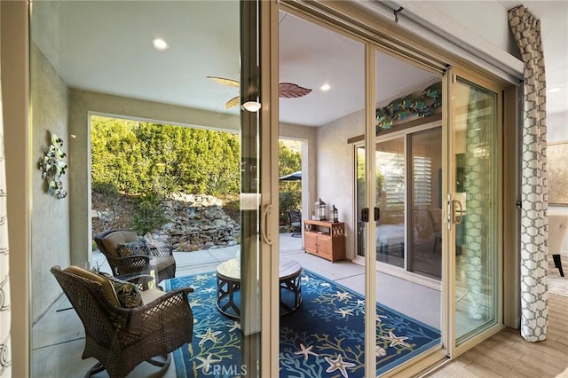 doorway featuring light wood-type flooring and french doors