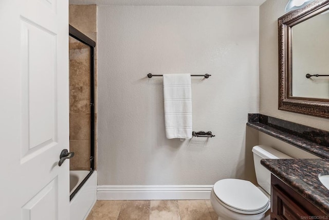 full bathroom with toilet, bath / shower combo with glass door, and vanity