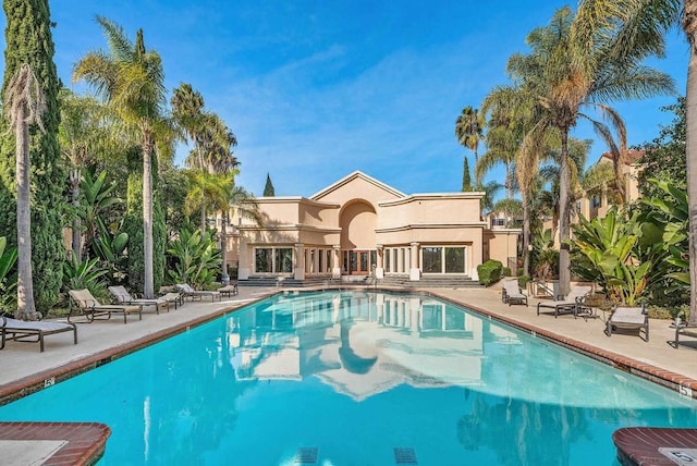 view of swimming pool with a patio