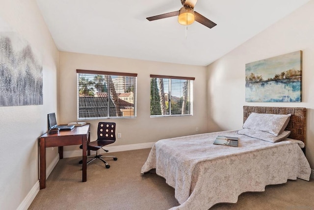 carpeted bedroom featuring ceiling fan and lofted ceiling