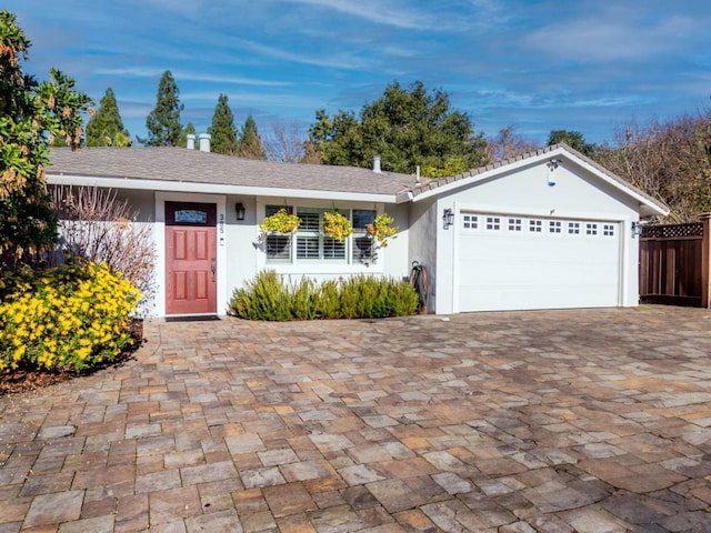 single story home with a garage