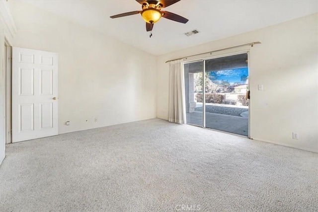 empty room featuring ceiling fan and carpet floors